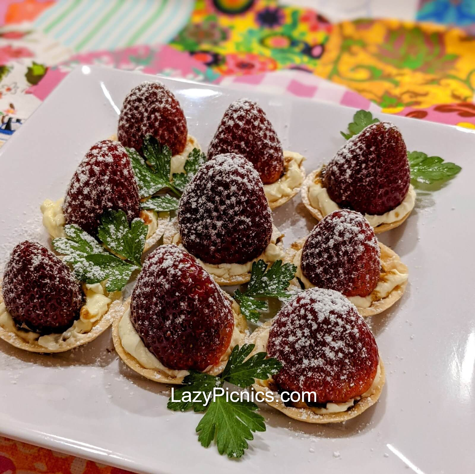 Strawberries in little pastry baskets.