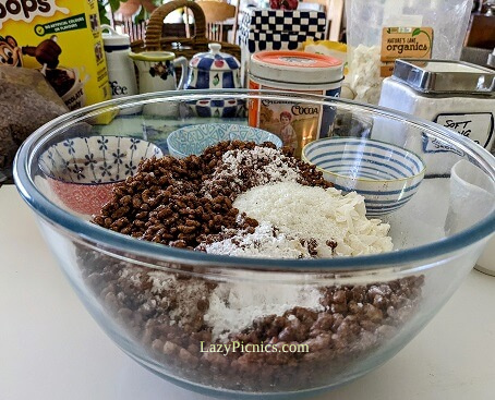 Dry ingredients to make chocolate crackle mixture for an Easter egg nest