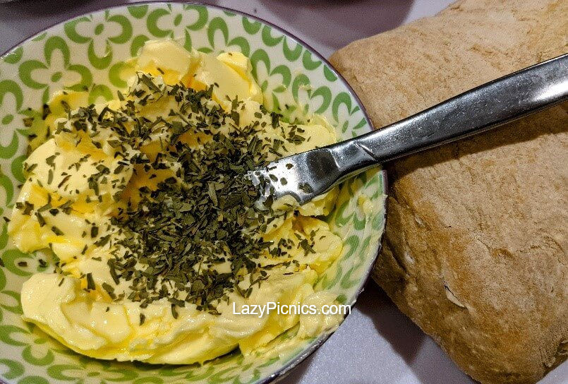 Bowl of butter for herb bread