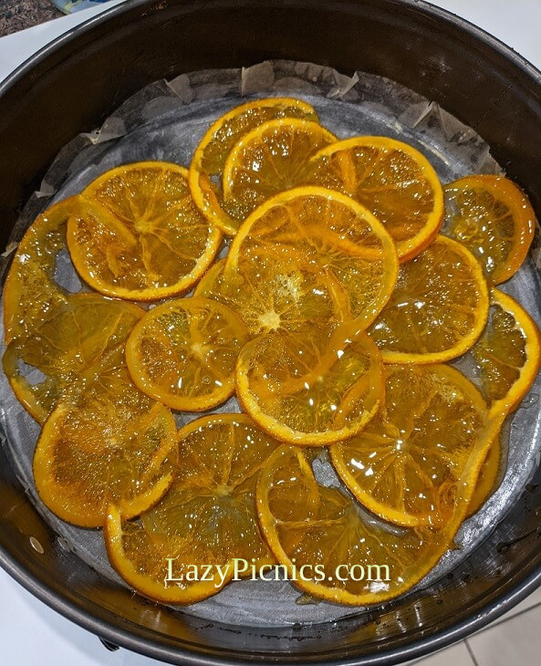Orange slices at bottom of tin