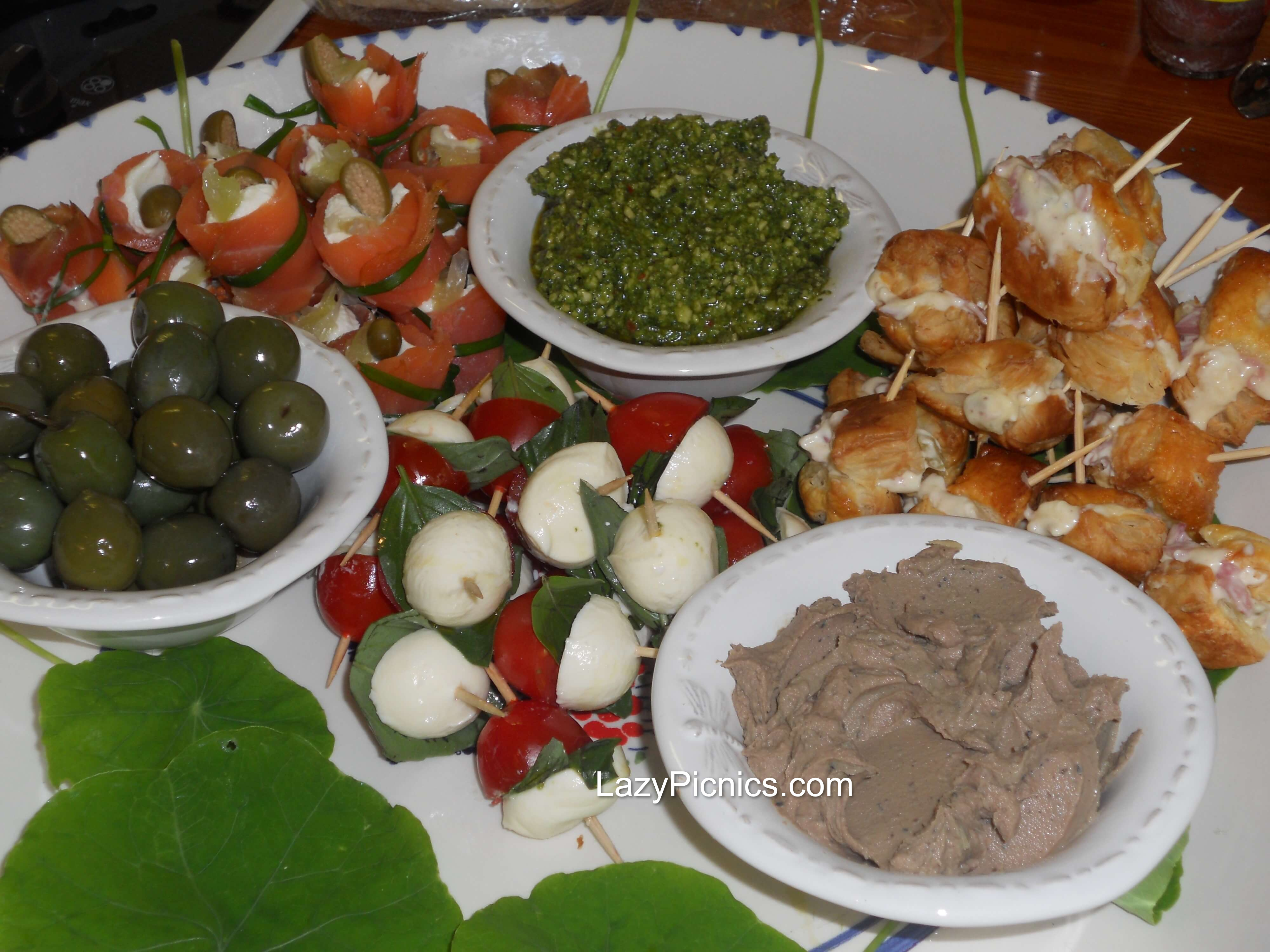 A large platter of appetizers... with smoked salmon, pate, olives and much more.